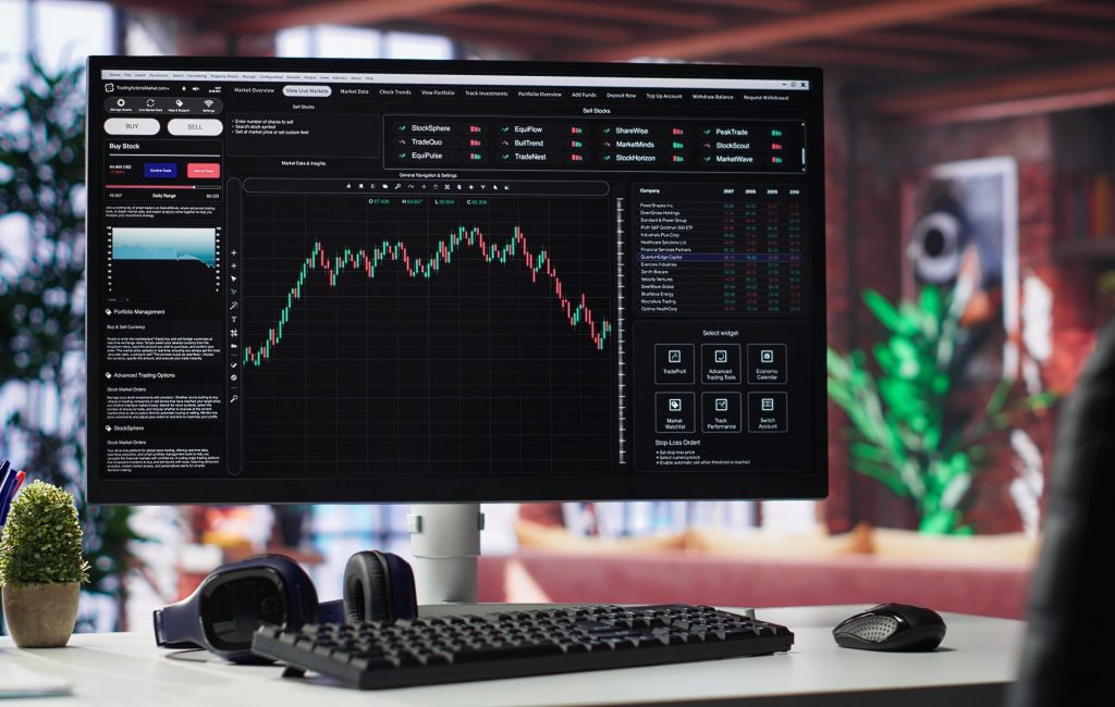 Empty workspace desktop running day trading stock market trends in stylish apartment. PC used for monitoring investment numbers and candle stick charts, a comfortable environment.