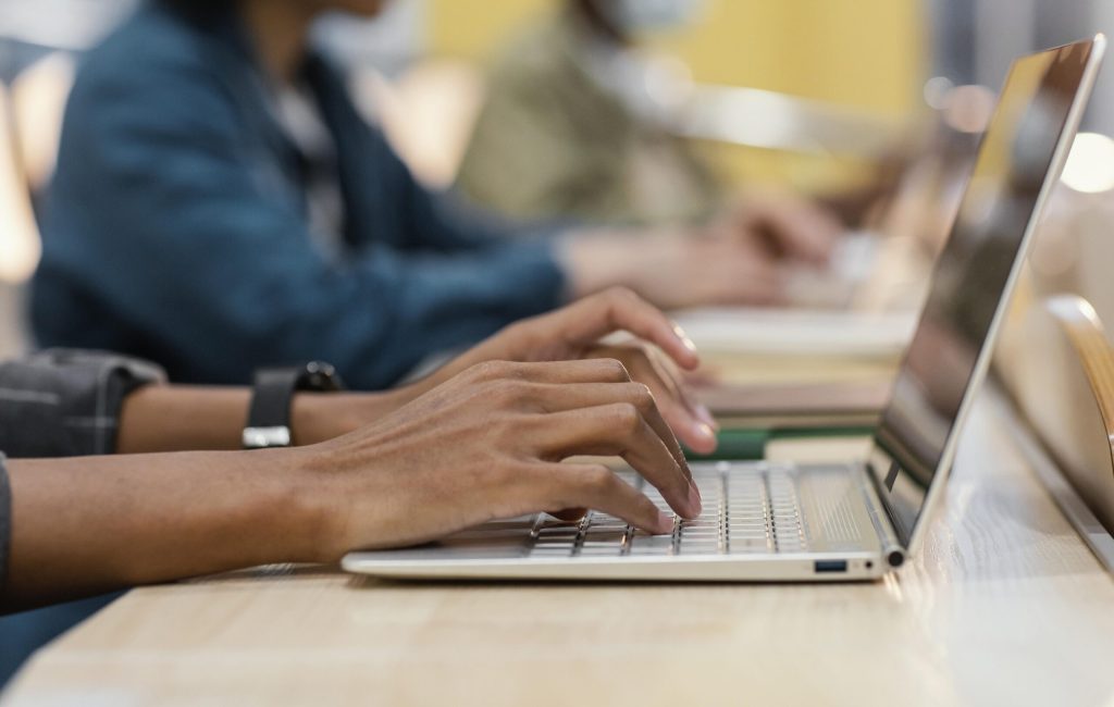 young-man-studying-university-library